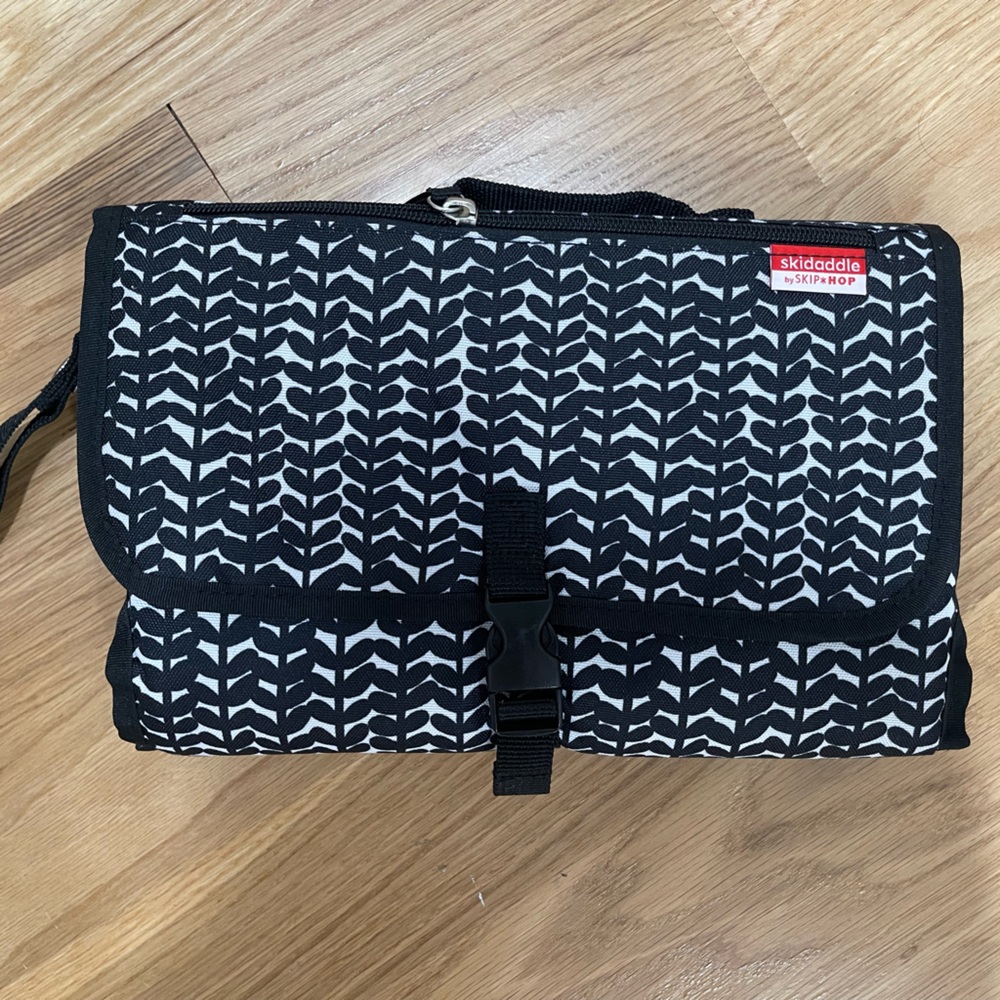 Portable baby changing pad / never been used